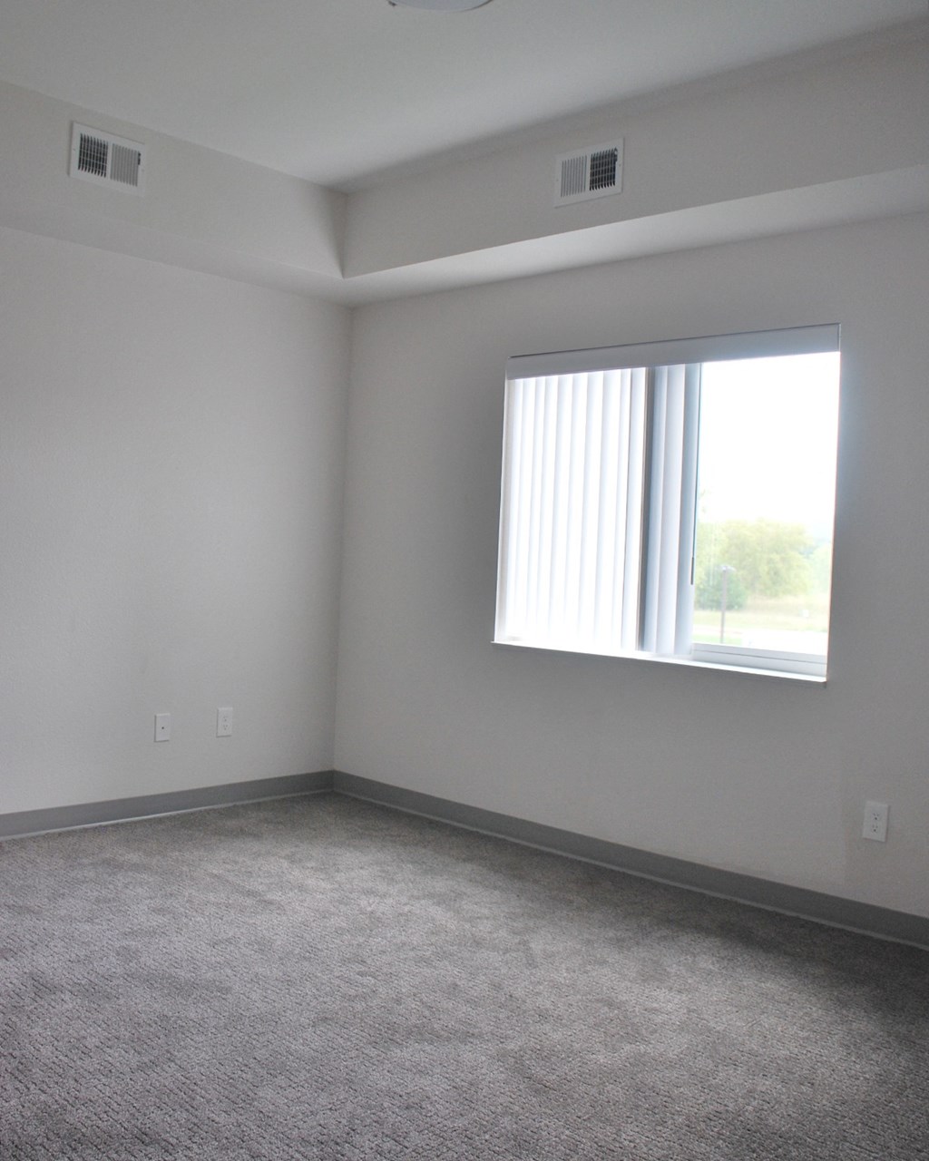 an empty room with a window