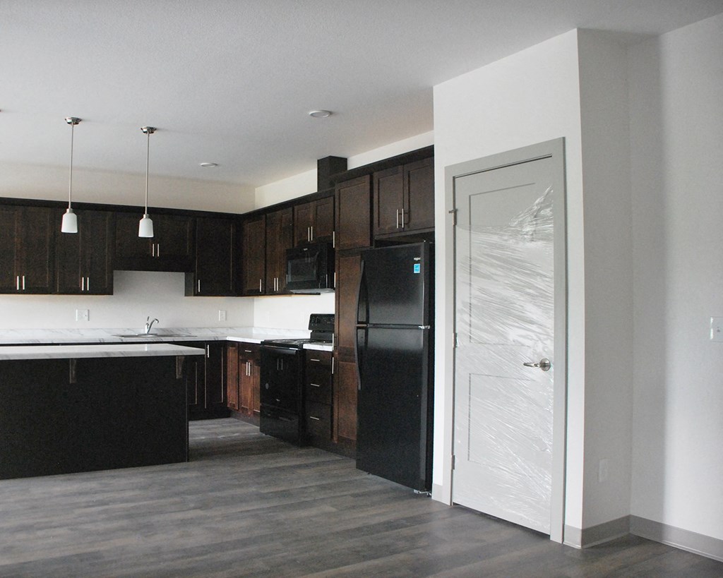 a view of the kitchen from the living room