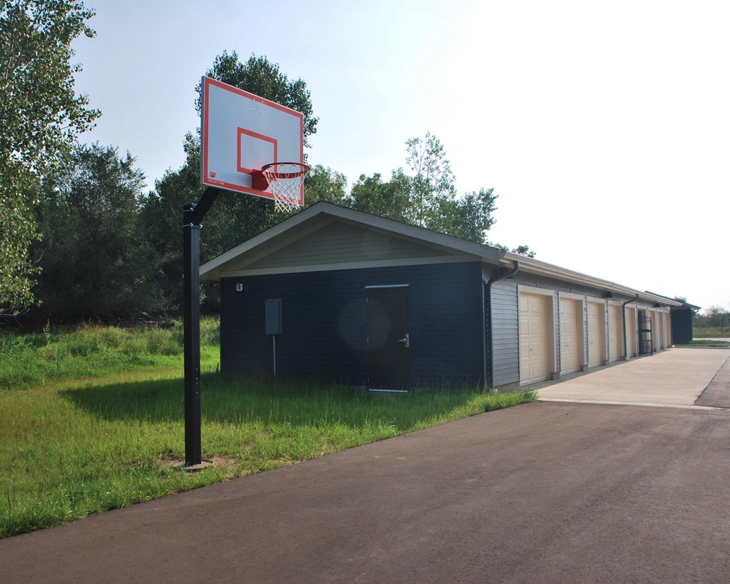 a basketball hoop in front of a building