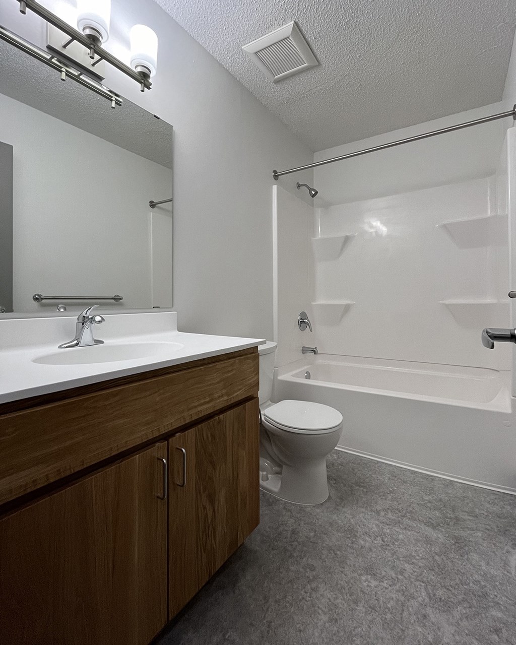 the preserve at ballantyne commons bathroom with toilet sink and shower