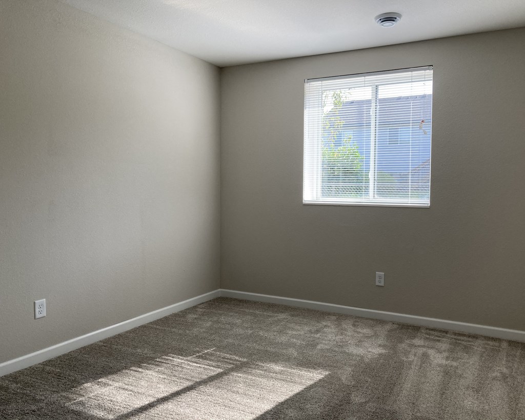 an empty room with a window