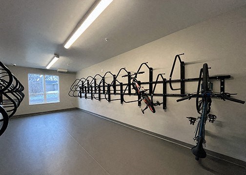 a room filled with bikes on a wall