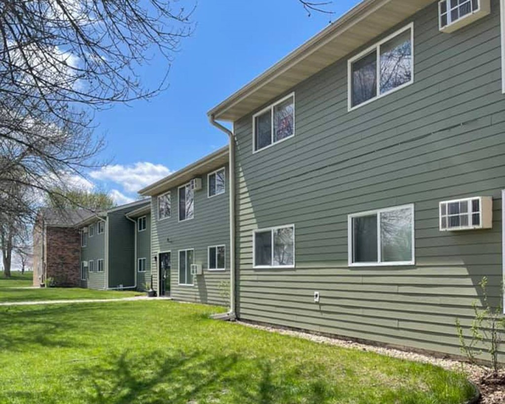 our apartments are located in a quiet neighborhood with grass