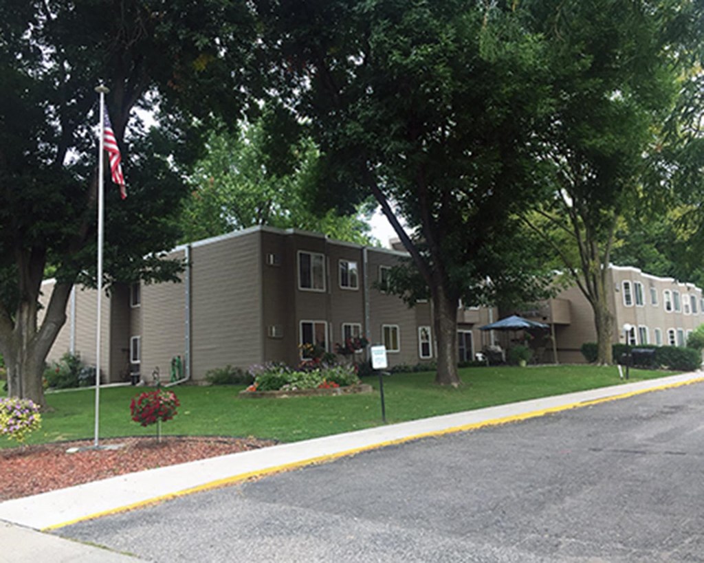 a building with an flag in front of it
