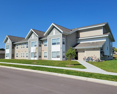 a row of houses on the side of a street