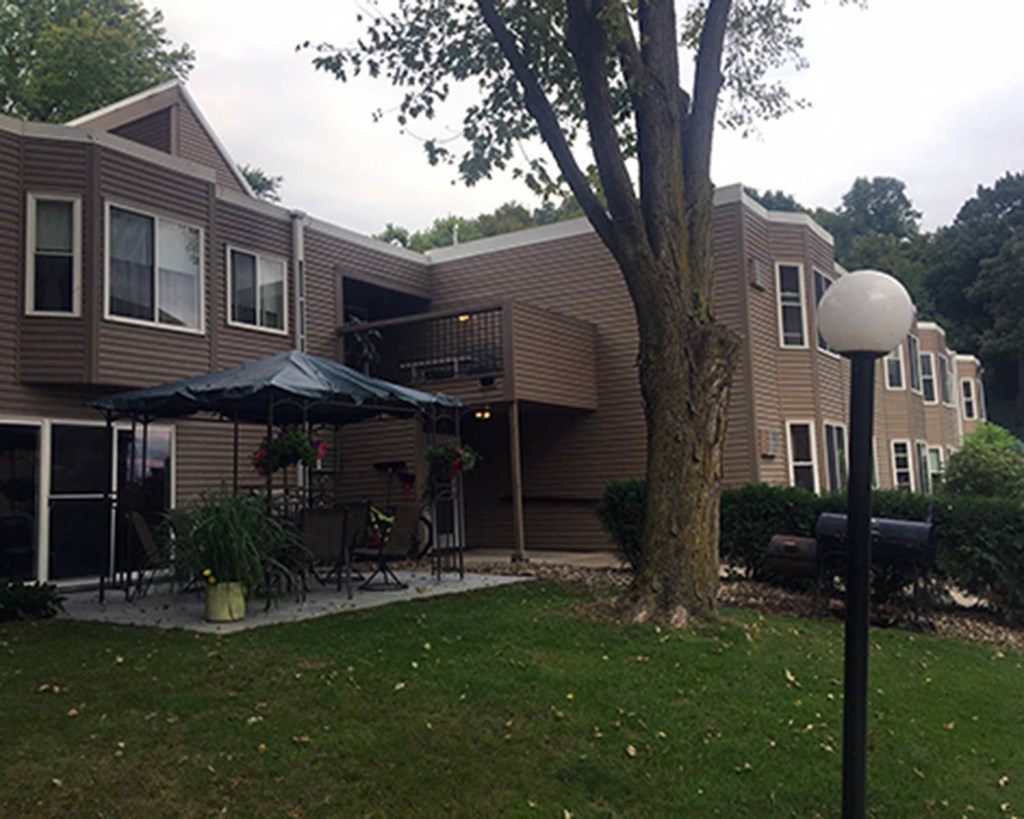 a view of the back of our house from the yard
