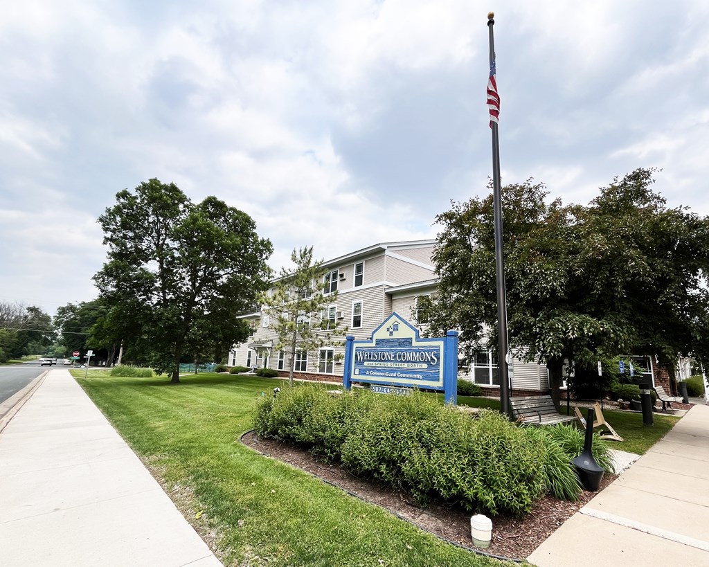 A building with a sign that says Westminster Commons.