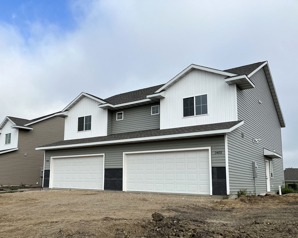 a house with a two car garage