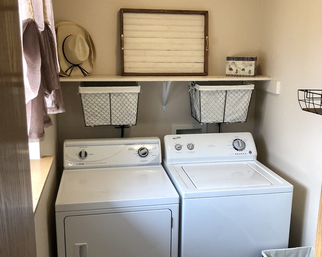 a washer and dryer in the laundry room