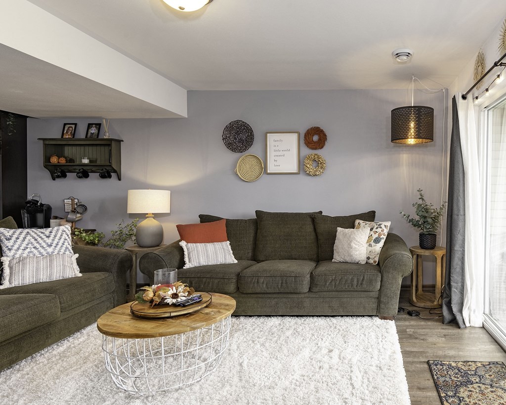 a living room with a couch and a coffee table