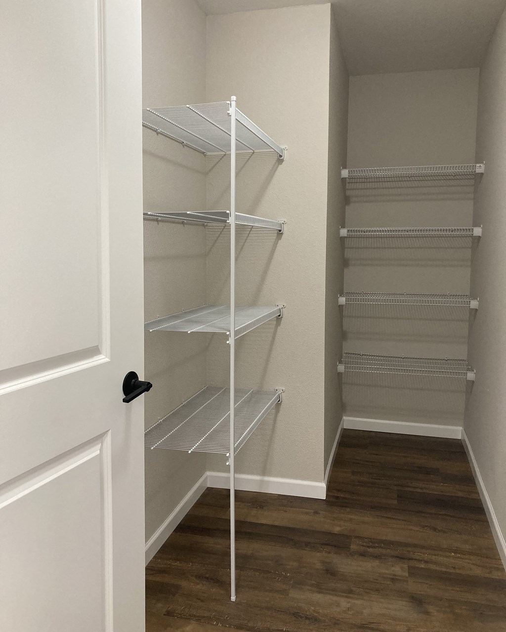 a walk in closet in a 555 waverly unit