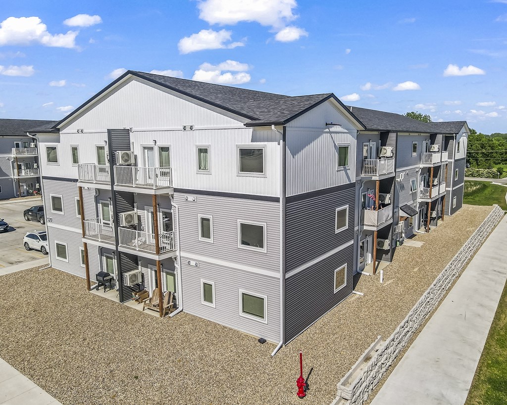 an aerial view of an apartment building with balconies