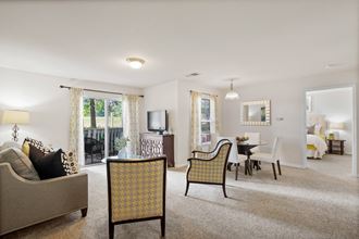our apartments offer a living room with a fireplace and a dining area - Photo Gallery 2