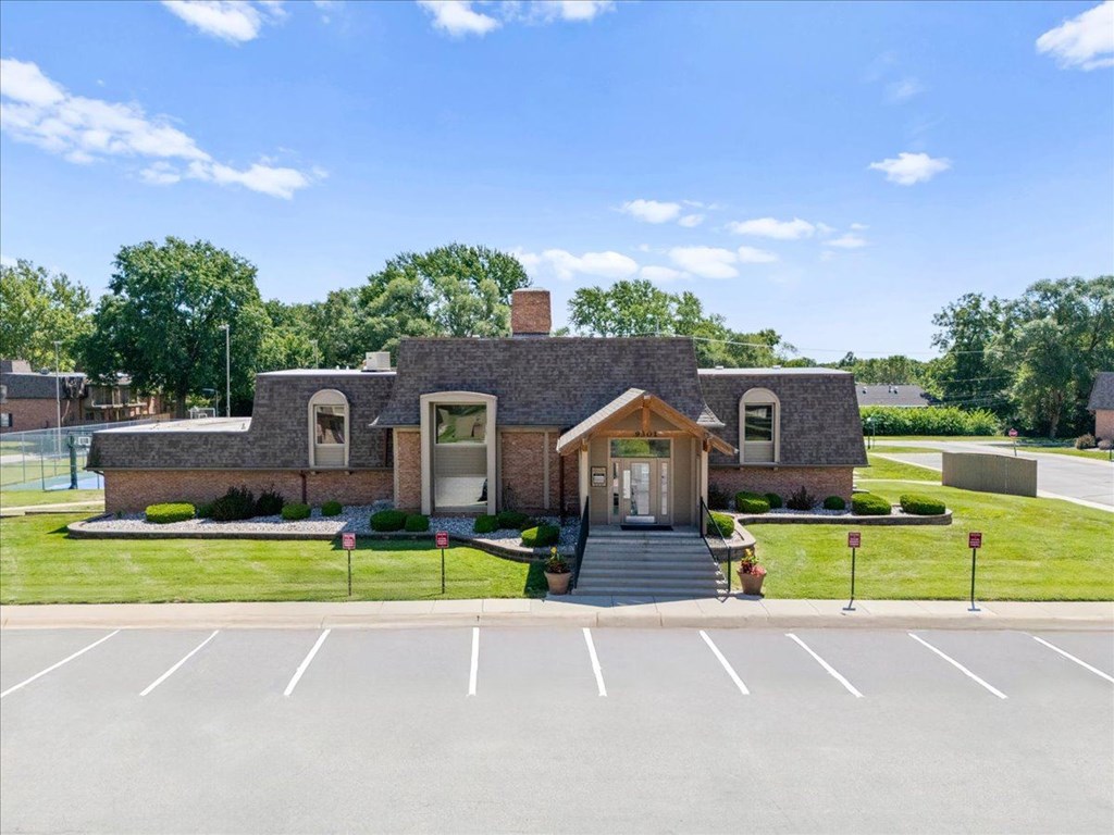 House with a parking space in front of it  at Louisburg Square Apartments & Townhomes, Kansas, 66212