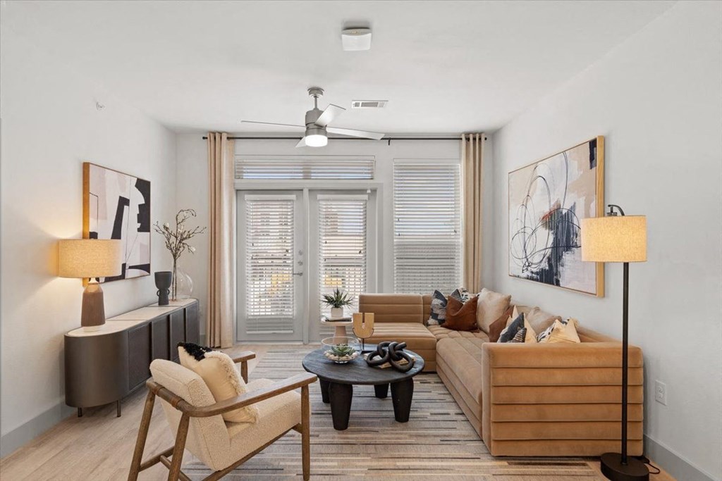 a living room with a couch and a table