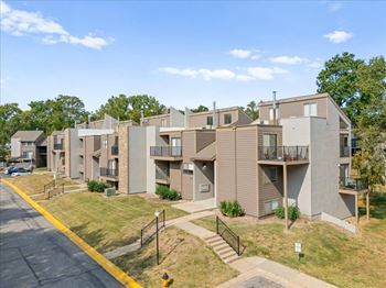 Apartment complex with a yellow line on the street.