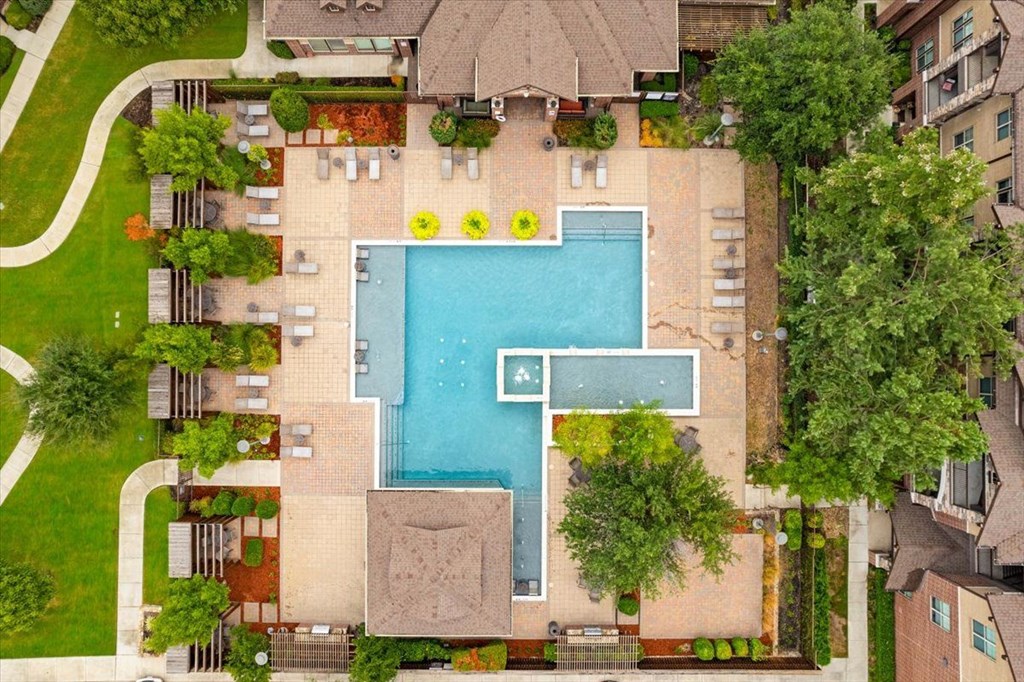 arial view of a house with a swimming pool
