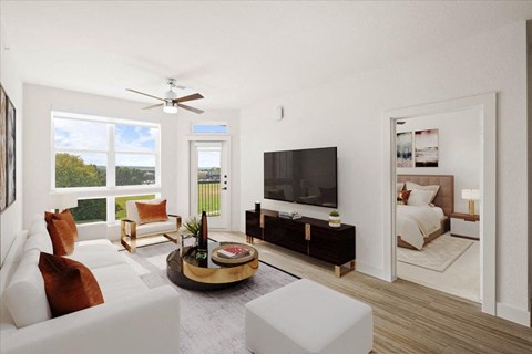 a living room with a couch and a tv