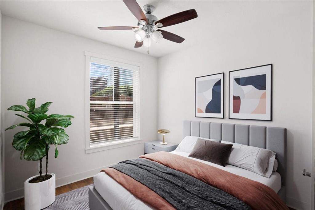 Bedroom with ceiling fan at Mirabelle Luxury Apartments, Kansas City
