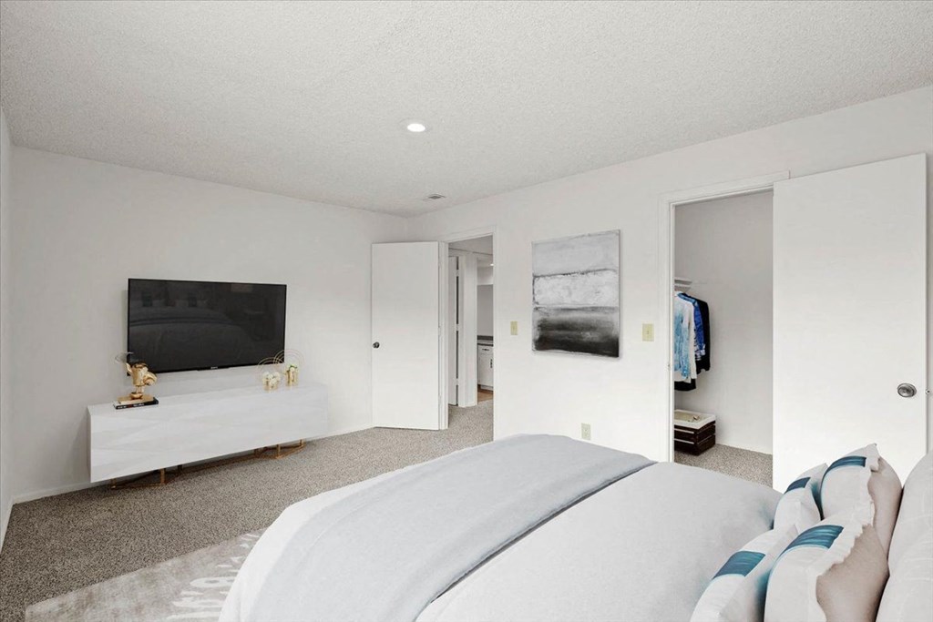 Spacious bedroom with a closet at Bremerton Park Apartment Homes , Prairie Village, KS