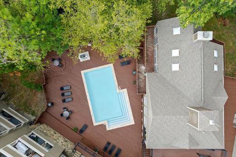 arial view of a house with a swimming pool at Creekview Apartment Homes, Texas