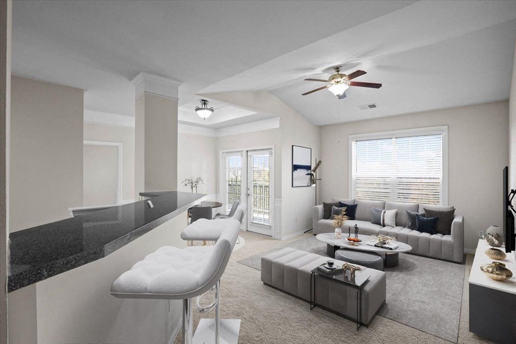 a living room with a couch and a table