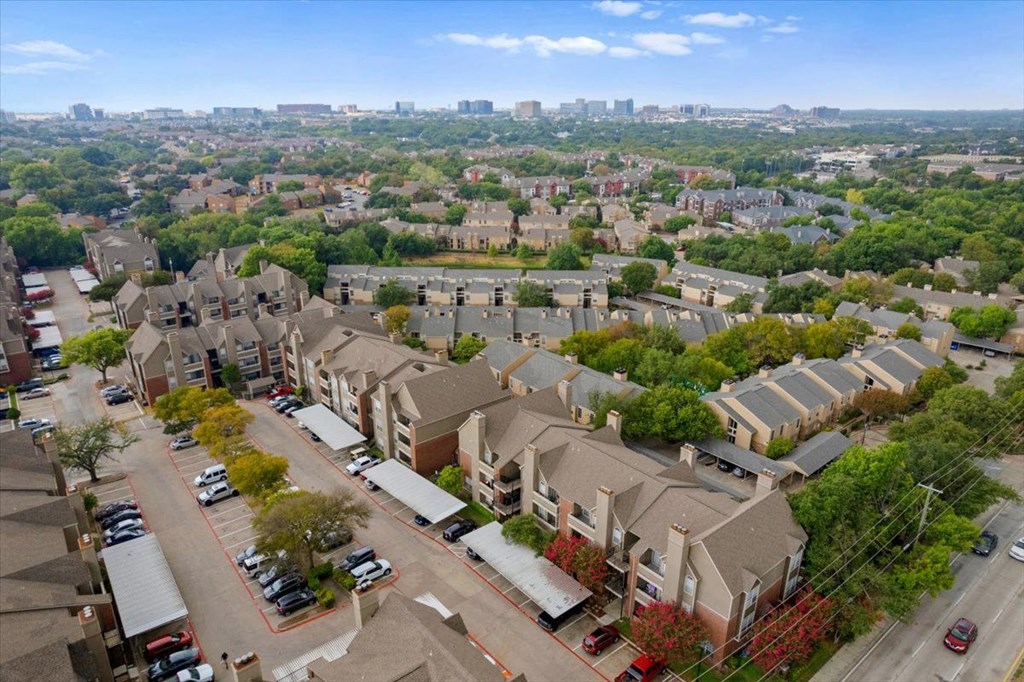 an aerial view of a neighborhood with houses and trees at Creekview Apartment Homes, Dallas, Texas