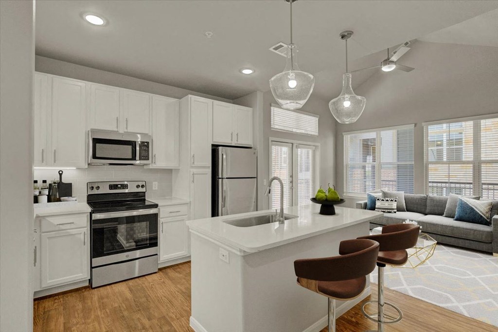 a kitchen with a sink and a counter top