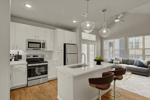a kitchen with a sink and a counter top