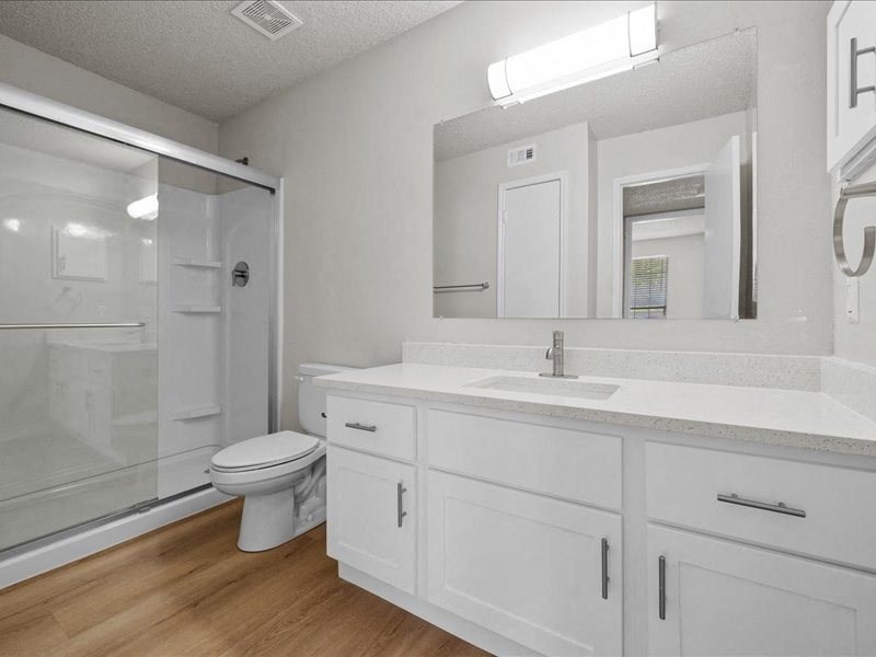 a bathroom with a sink toilet and a shower at Highland Park Apartment Homes, Kansas, 66214