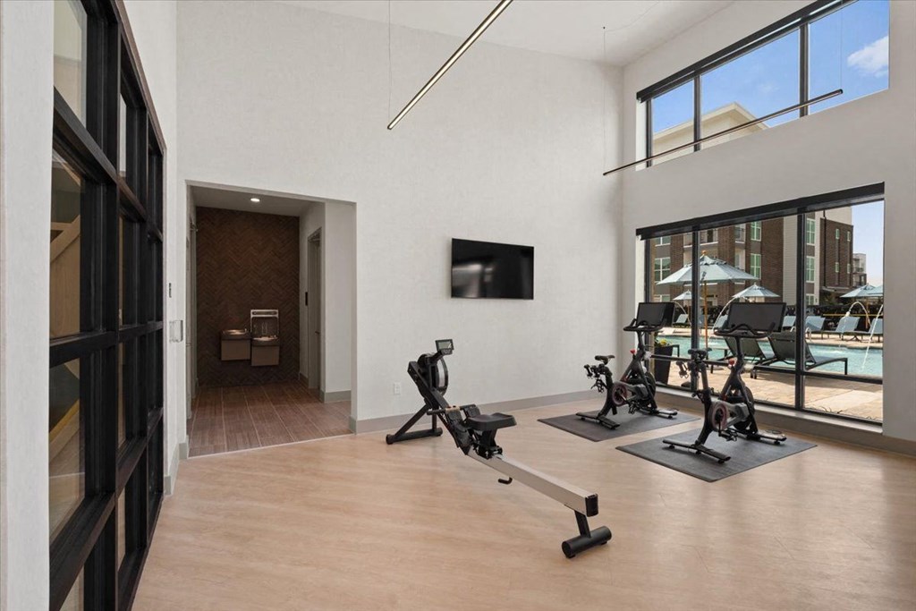 Peleton Bike and rowing machine in Gym at rye Bunker Hill