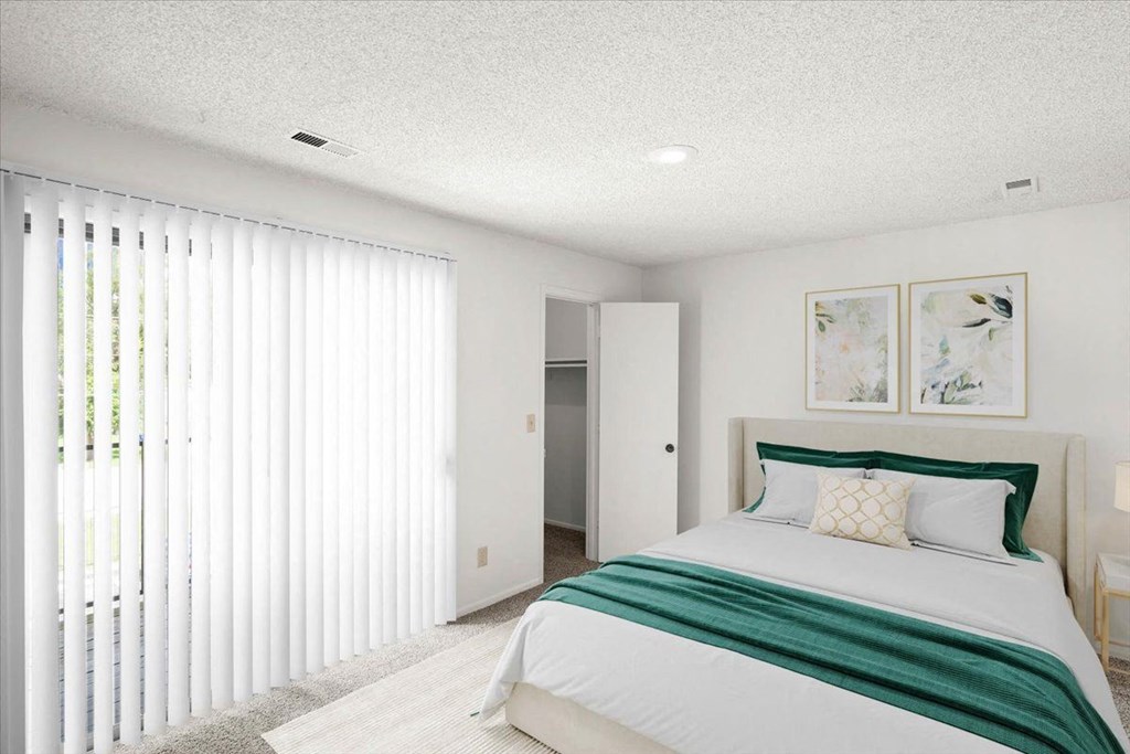 Bedroom with oversized windows at Bremerton Park Apartment Homes , Kansas