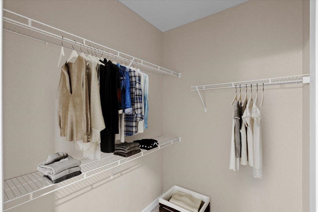 a walk in closet in a 555 waverly unit