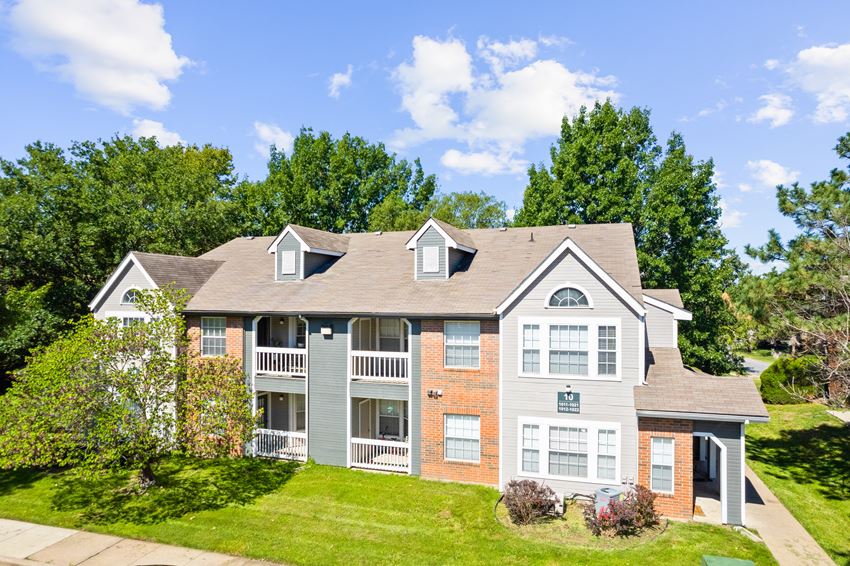 a house on a hill with trees in the background a house on a hill with trees in the backgroundat Stonebriar Apartments, Overland Park, Kansas - Photo Gallery