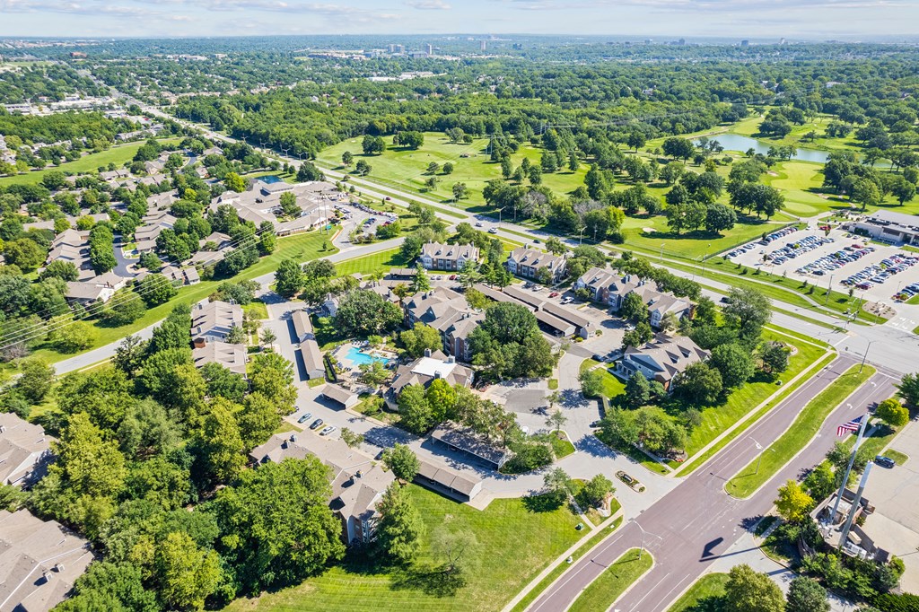 an aerial view of a neighborhood with houses and treesat Stonebriar Apartments, Kansas