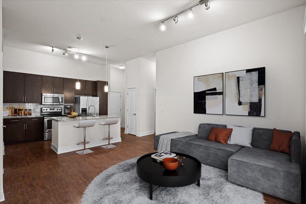 a living room with a couch and a table