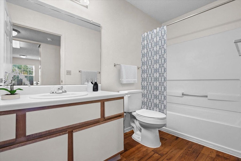 a bathroom with a toilet and a sink