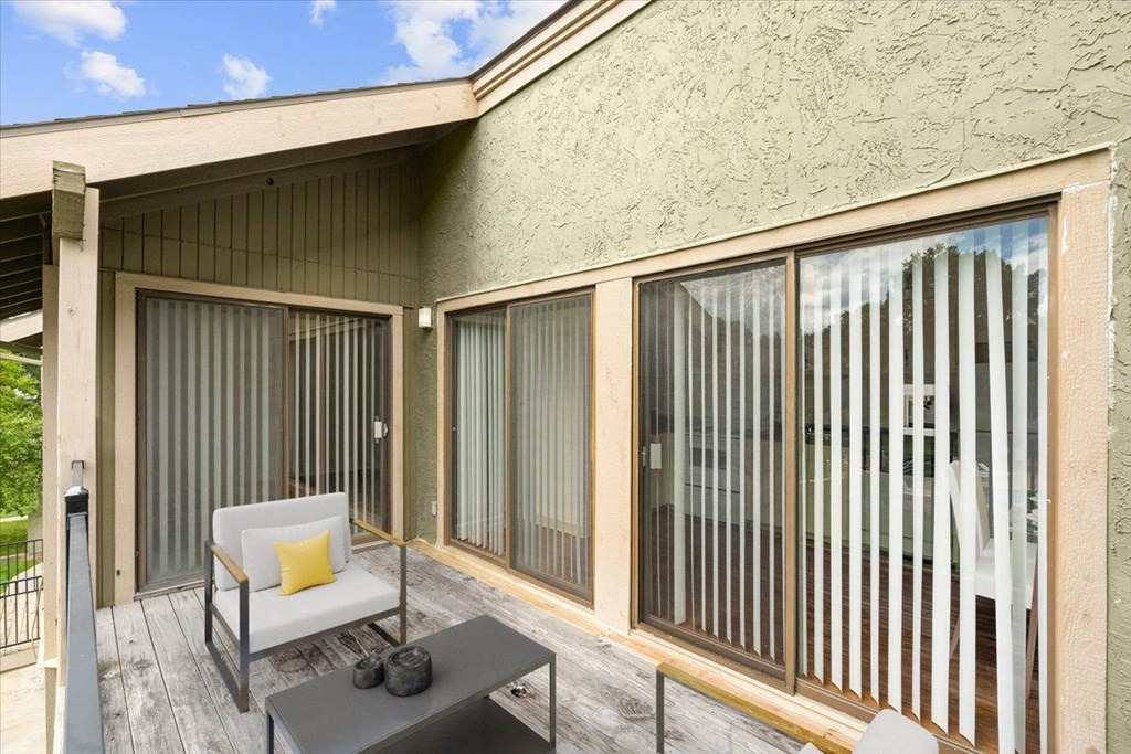 Balcony with comfortable chairs at Bremerton Park Apartment Homes , Prairie Village, 66204