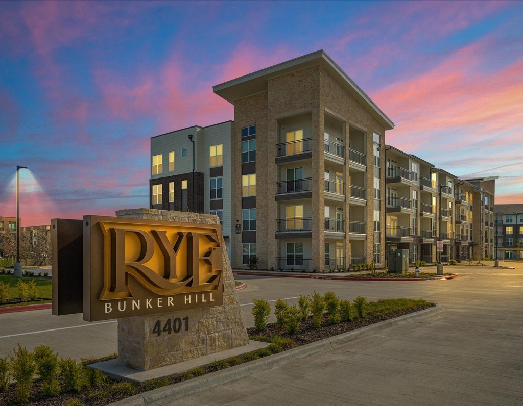 a large building with a sign in front of it
