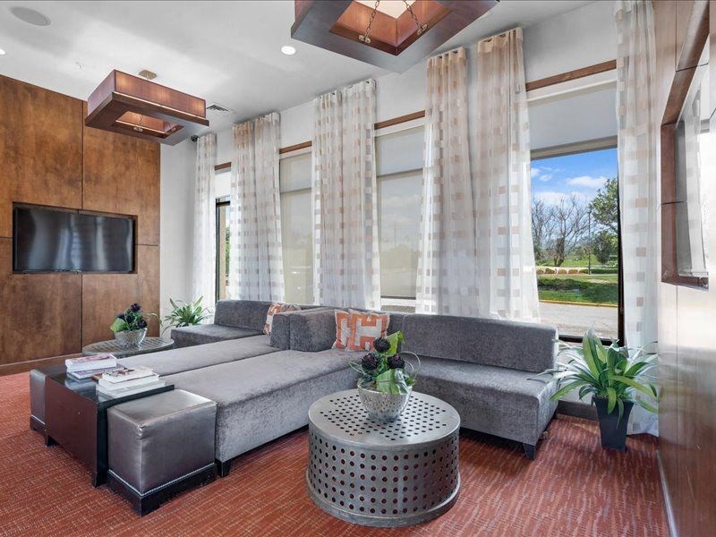 a living room with a couch and a table