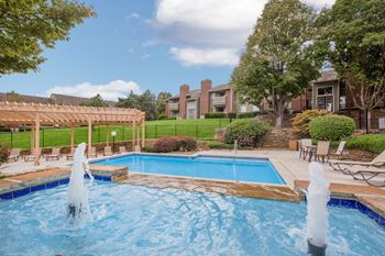 Swimming pool and fountain at Coventry Oaks Apartments, Overland Park, KS