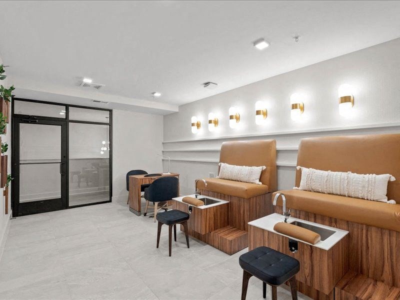 a waiting room of a hospital with chairs and couches