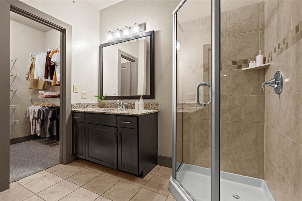 Bathroom With Vanity at Cypress at Lewisville Apartment Homes, Lewisville Texas