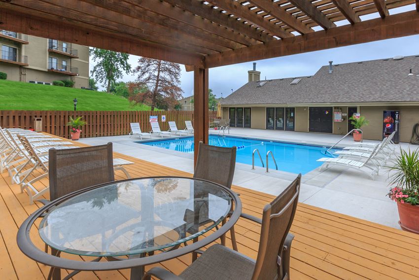 Swimming Pool side seating area Swimming Pool side seating area at Cloverset Valley Apartments, Kansas City, 64114 - Photo Gallery