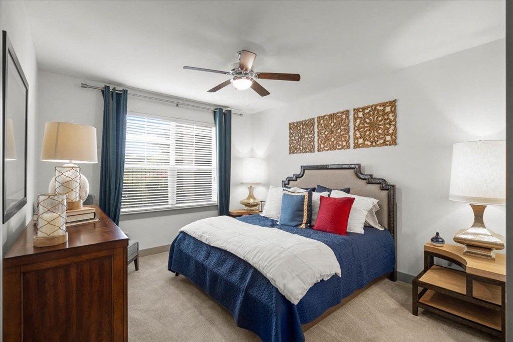 Decorated bedroom at Ovation at Lewisville Apartment Homes, Lewisville, 75067