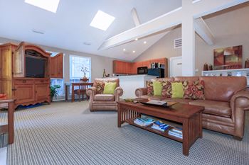 clubhouse with seating areas  at Creekview Apartment Homes, Dallas, 75254