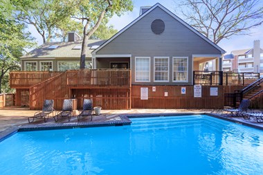 pool with clubhouse  at Creekview Apartment Homes, Dallas, Texas - Photo Gallery 5