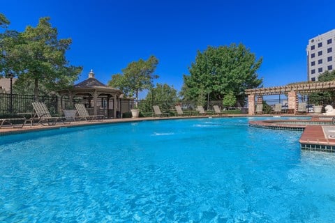 Swimming pool view at The Clairborne Apartment Homes, Texas