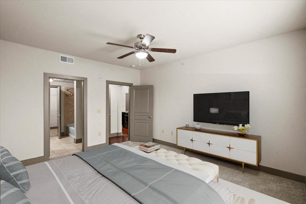 Bedroom With TV at Cypress at Lewisville Apartment Homes, Lewisville