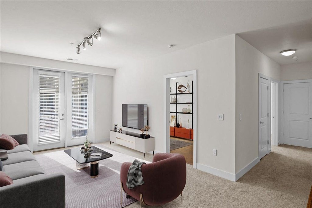 a living room with a couch and a tv